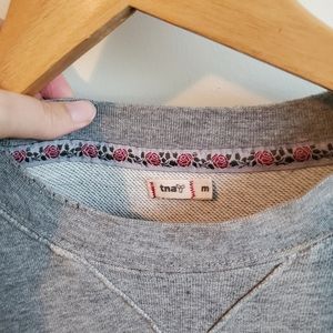 Aritzia TNA distressed cotton sweatshirt